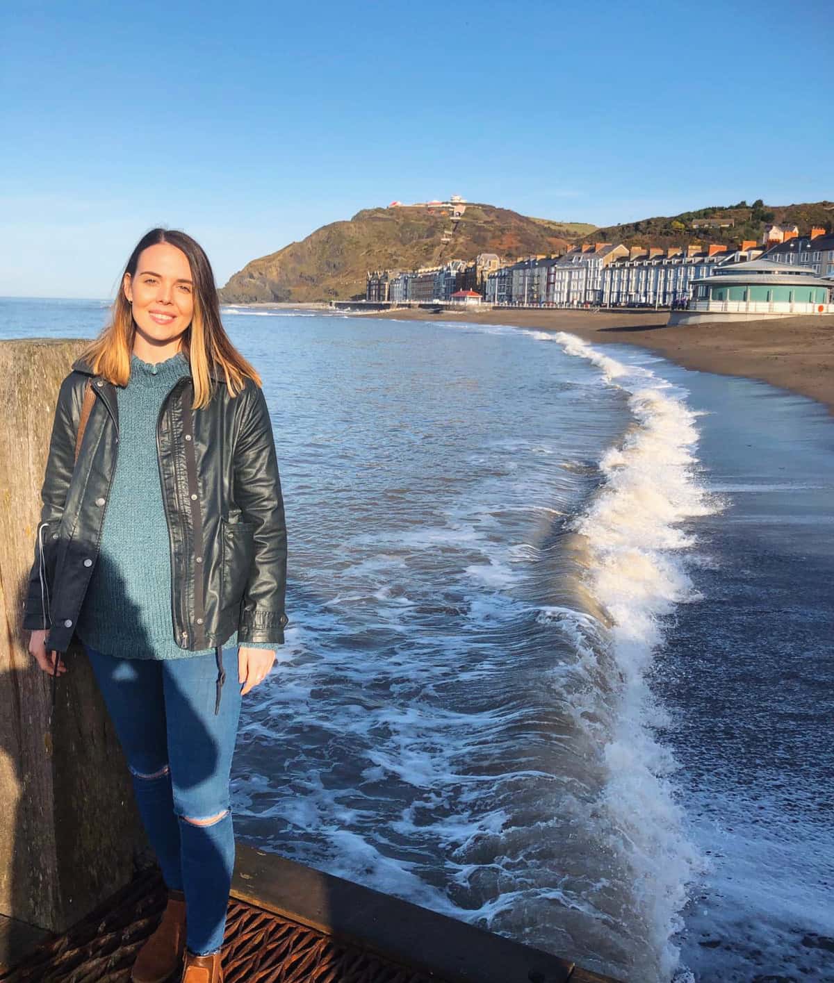 Sioned stood at Aberystwyth seafront